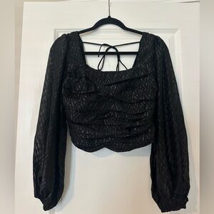Vestique black top Size small NWOT. Festive boutique top!